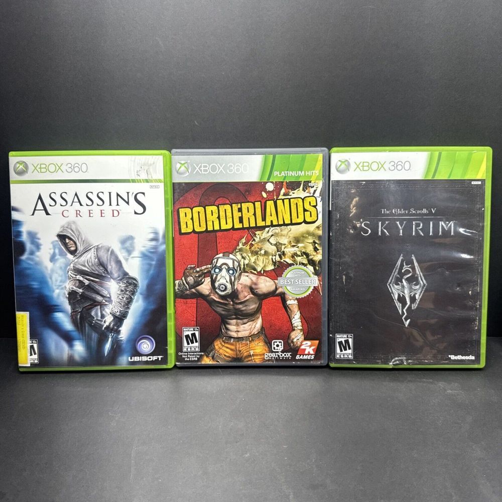 xbox  game lot Borderlands, Assassin's Creed, Skyrim‎